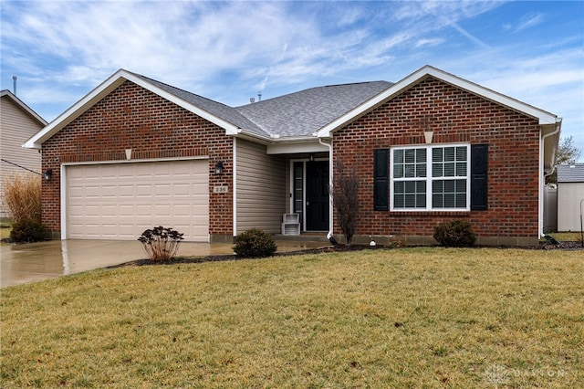 view of front facade featuring a front lawn and a garage