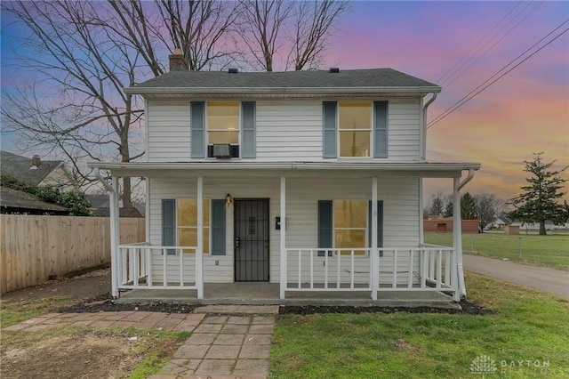 view of front property with a yard