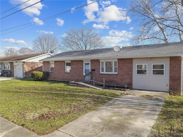 ranch-style home with a front lawn