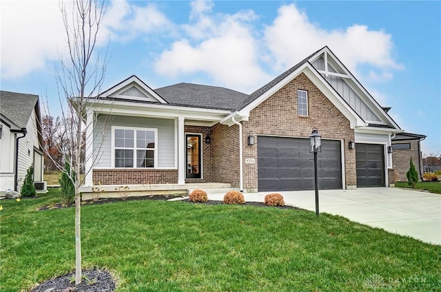 view of front facade featuring a front yard and a garage