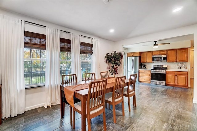 dining space featuring ceiling fan