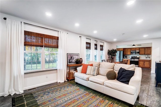 living room featuring ceiling fan