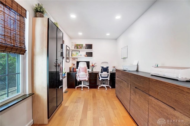 office area featuring light hardwood / wood-style flooring