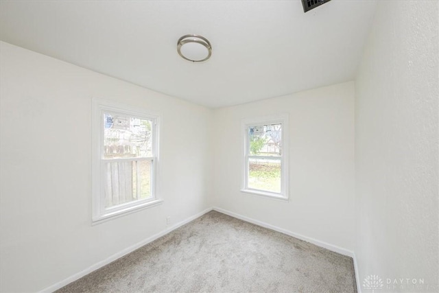 view of carpeted spare room