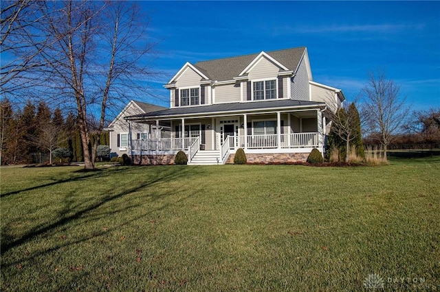 view of front of property with covered porch and a front yard