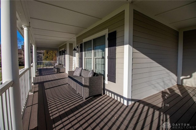 wooden deck with grilling area