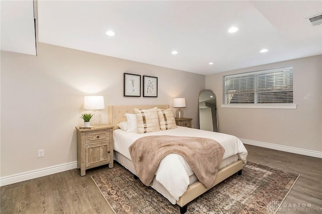 bedroom featuring hardwood / wood-style floors