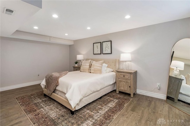 bedroom featuring dark wood-type flooring