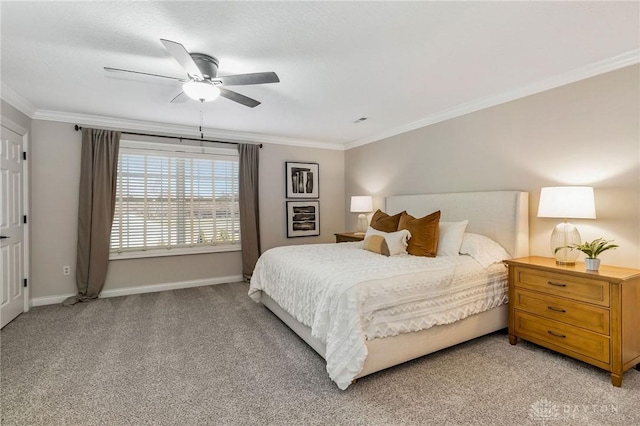 bedroom with ceiling fan, light carpet, and ornamental molding