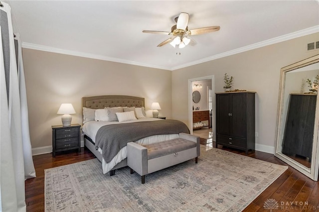 bedroom with dark hardwood / wood-style flooring, ceiling fan, and crown molding