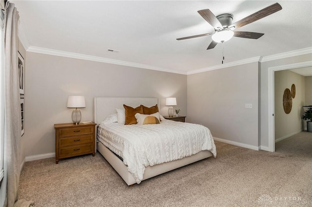 bedroom featuring light carpet, ceiling fan, and crown molding