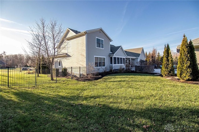 view of home's exterior featuring a lawn