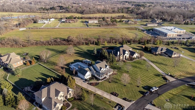 birds eye view of property featuring a rural view