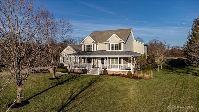 view of front of house with a front lawn and a porch