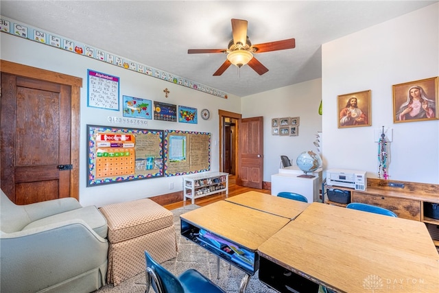 office area featuring hardwood / wood-style flooring and ceiling fan