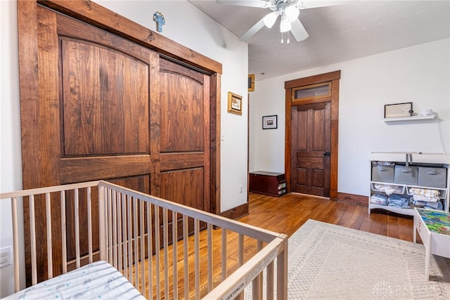 hall with hardwood / wood-style floors