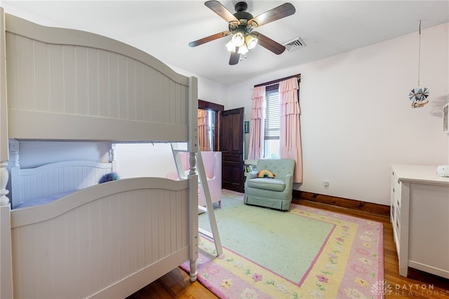 bedroom featuring ceiling fan and wood-type flooring