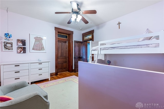 bedroom featuring ceiling fan and light hardwood / wood-style floors