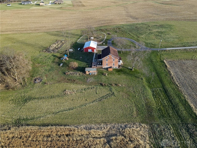 birds eye view of property featuring a rural view