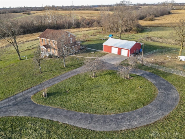 birds eye view of property featuring a rural view