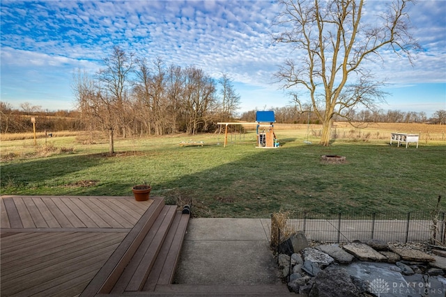 view of yard with a rural view and a playground