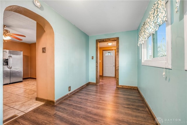 hall with hardwood / wood-style floors