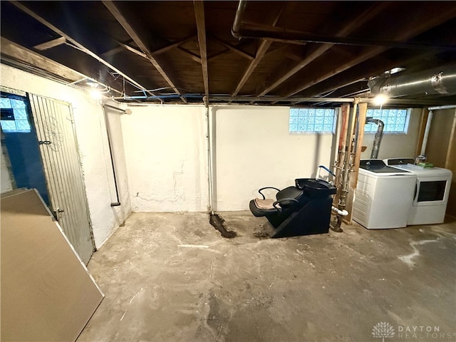 basement with separate washer and dryer