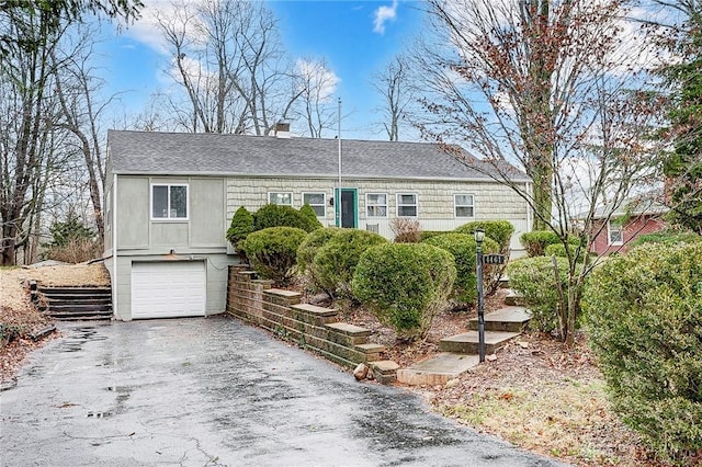 view of front of home featuring a garage