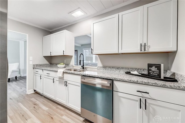 kitchen with stainless steel dishwasher, sink, white cabinets, and crown molding