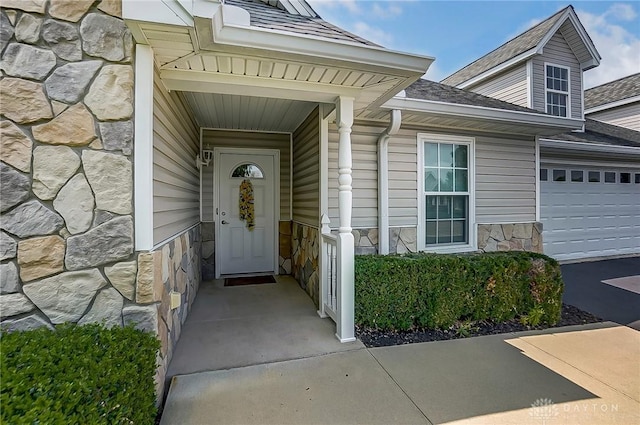 property entrance featuring a garage