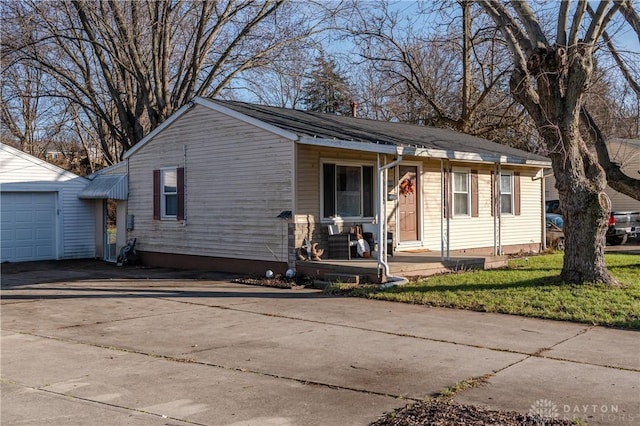 view of front of property with driveway and a garage