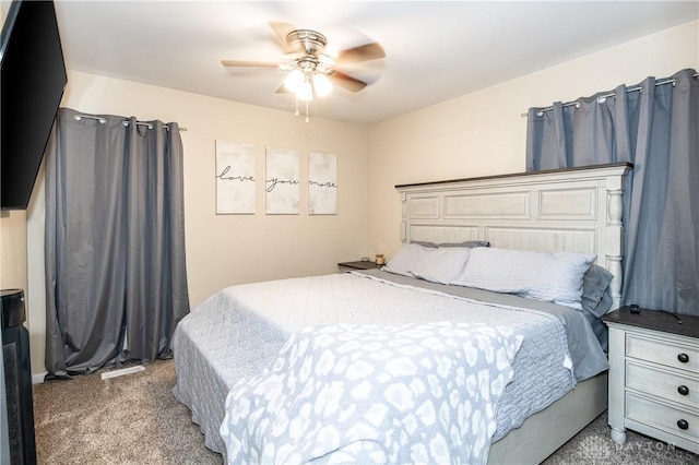 bedroom with ceiling fan and carpet