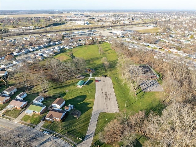 birds eye view of property with a residential view