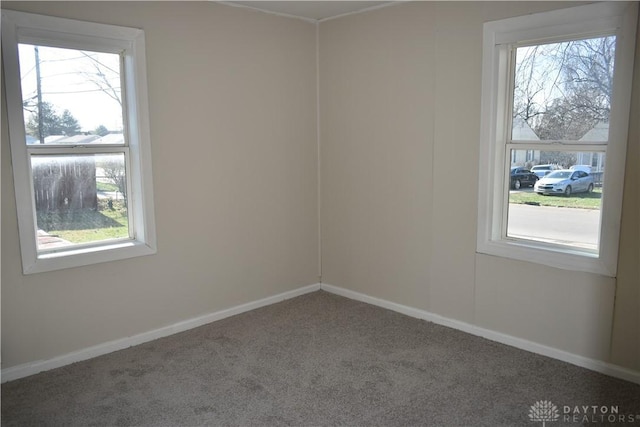 unfurnished room with carpet floors