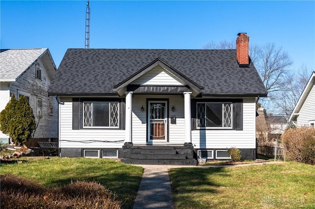 view of front of home with a front lawn