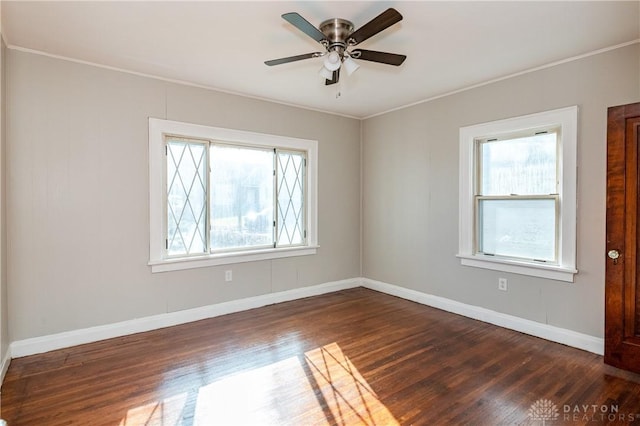 unfurnished room featuring dark hardwood / wood-style floors and ceiling fan