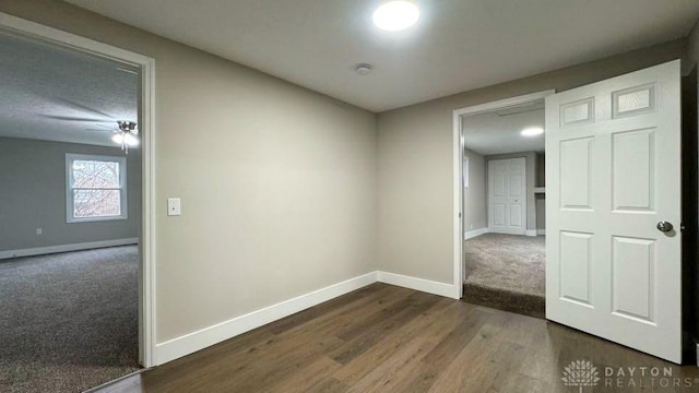 spare room featuring dark hardwood / wood-style flooring