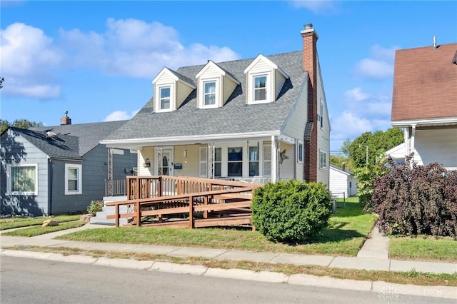 cape cod home with covered porch