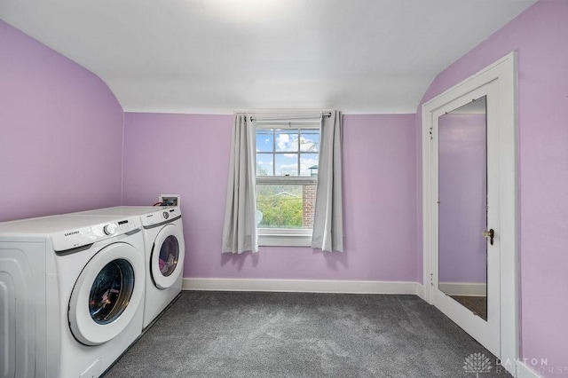 clothes washing area featuring dark colored carpet and washing machine and clothes dryer