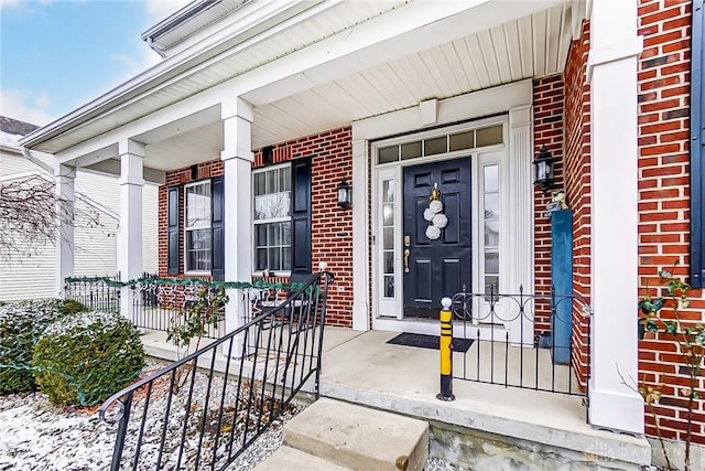 entrance to property with covered porch