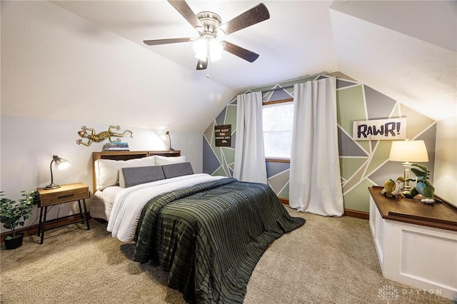 bedroom featuring carpet flooring, ceiling fan, and lofted ceiling