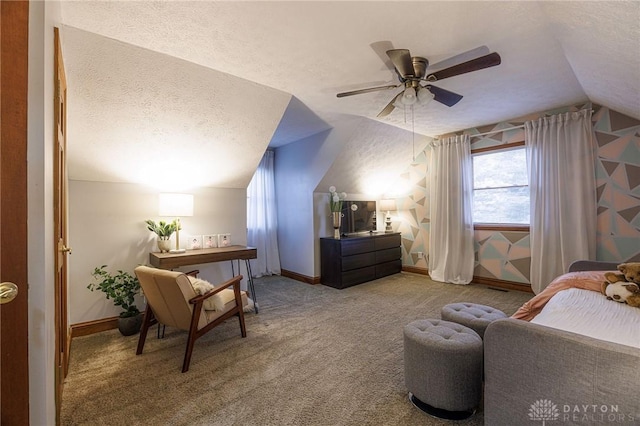 carpeted bedroom featuring a textured ceiling, ceiling fan, and lofted ceiling