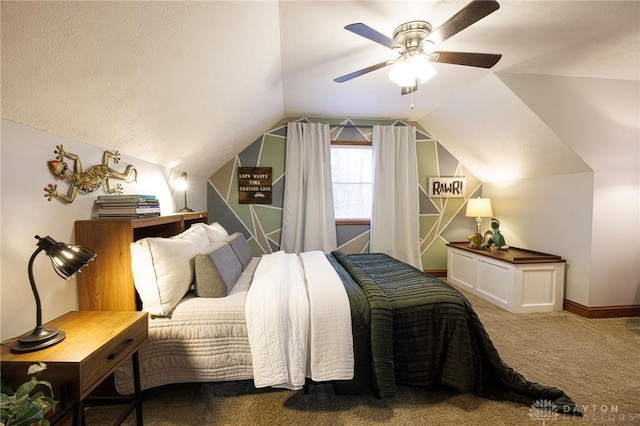 bedroom with ceiling fan, carpet, and lofted ceiling