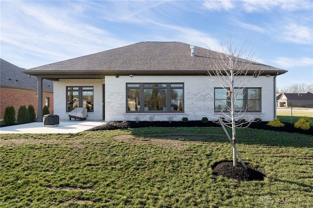 back of house featuring french doors, a yard, and a patio