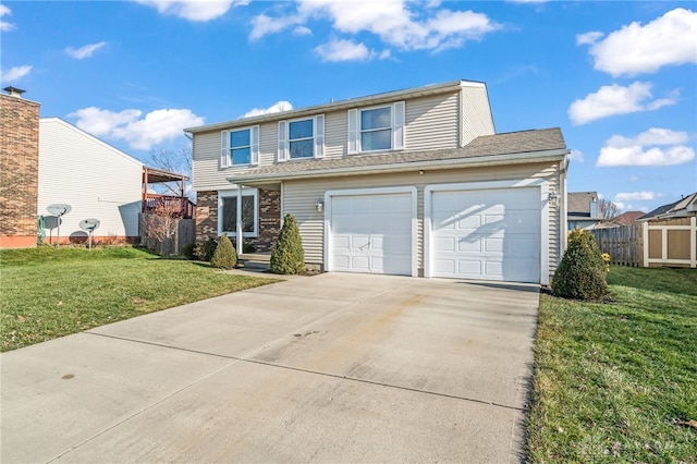 view of front property featuring a front yard and a garage