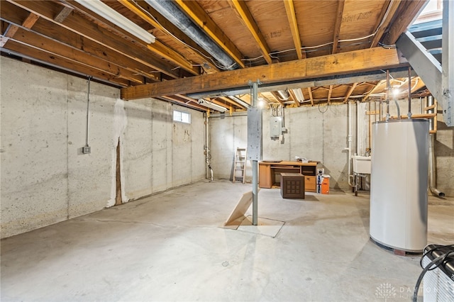 basement with gas water heater and sink