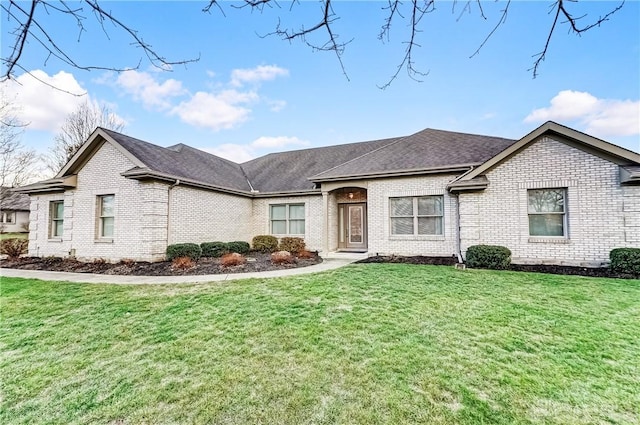 ranch-style house featuring a front yard