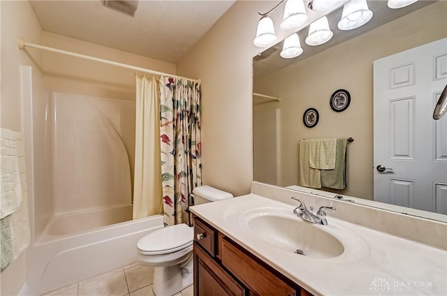 full bathroom with toilet, vanity, tile patterned flooring, a textured ceiling, and shower / tub combo with curtain