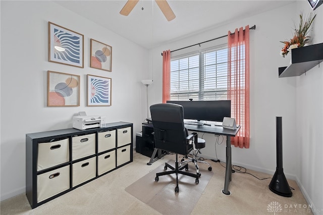 office with ceiling fan and light colored carpet