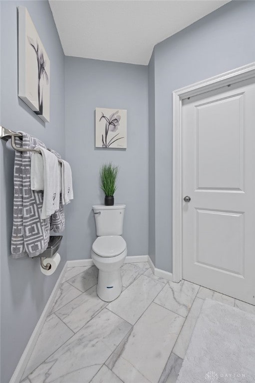 bathroom featuring toilet